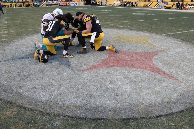 If NFL players take a knee, do it in prayer for a divided nation