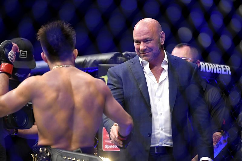 UFC president Dana White shakes the hand of Henry Cejudo