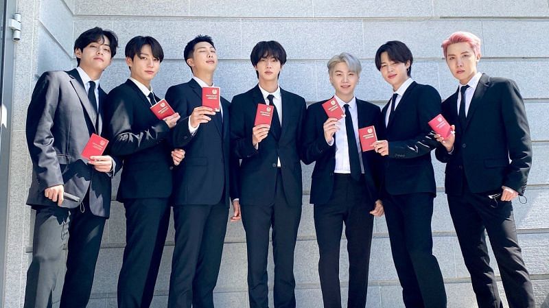 K-pop group BTS with their Diplomatic Passports (Image via BigHit official, Twitter)