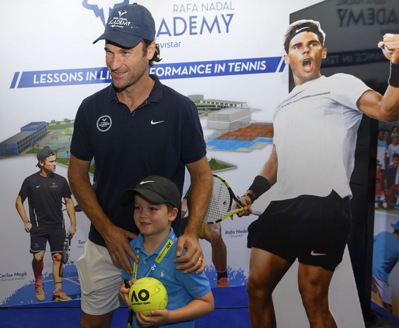 Carlos Moya endorses Rafael Nadal&#039;s academy during the Kids Day at the 2018 Australian Open