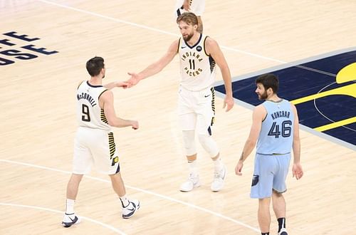 Domantas Sabonis and TJ McConnell of the Indiana Pacers