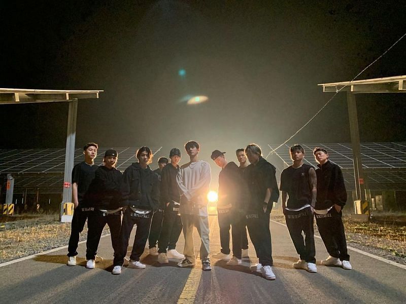 A still of Kim Hanbin and the Waterfall team (Image via Instagram/shxxbi131)