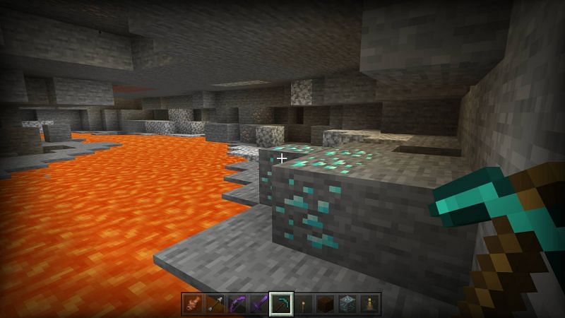 Minecraft diamonds next to a lava lake (Image via Minecraft)