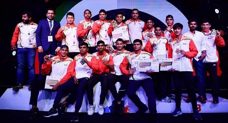The Indian youth men&#039;s boxing contingent pose with their medals.