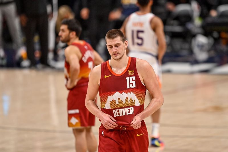 Nikola Jokic (#15) of the Denver Nuggets walks off the court ejected