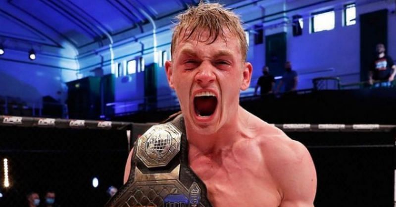 Ian Garry celebrates after winning the Cage Warriors welterweight championship (Image Credit: @iangarry on Instagram)