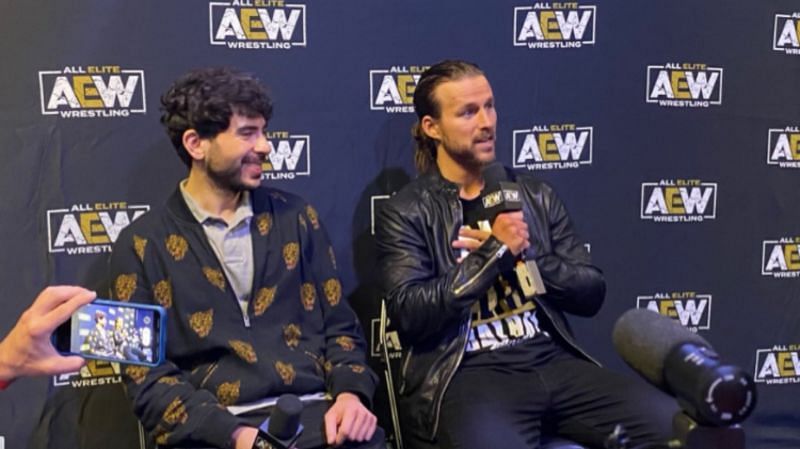 AEW CEO Tony Khan and Adam Cole attending a media event