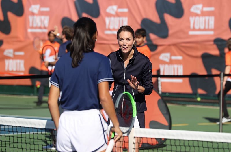 Kate Middleton on a tennis court with Emma Raducanu.