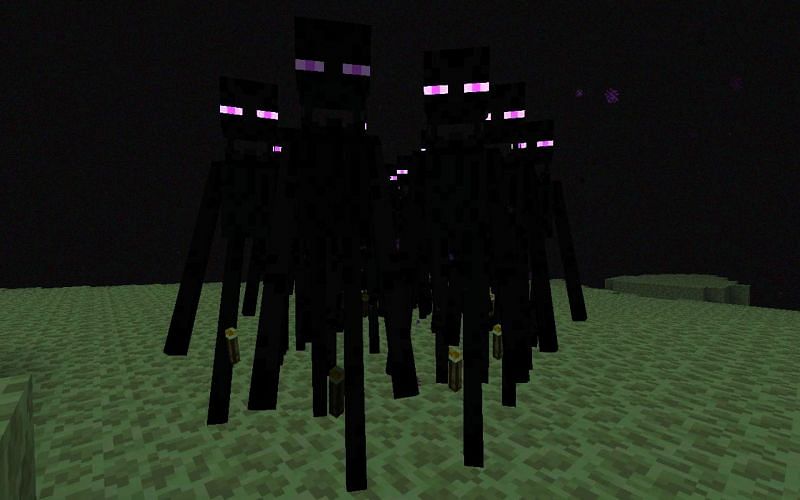 An image of a swarm of endermen in the End realm (Image via Minecraft)