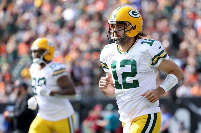 What is Aaron Rodgers' record against the Arizona Cardinals in NFL?
