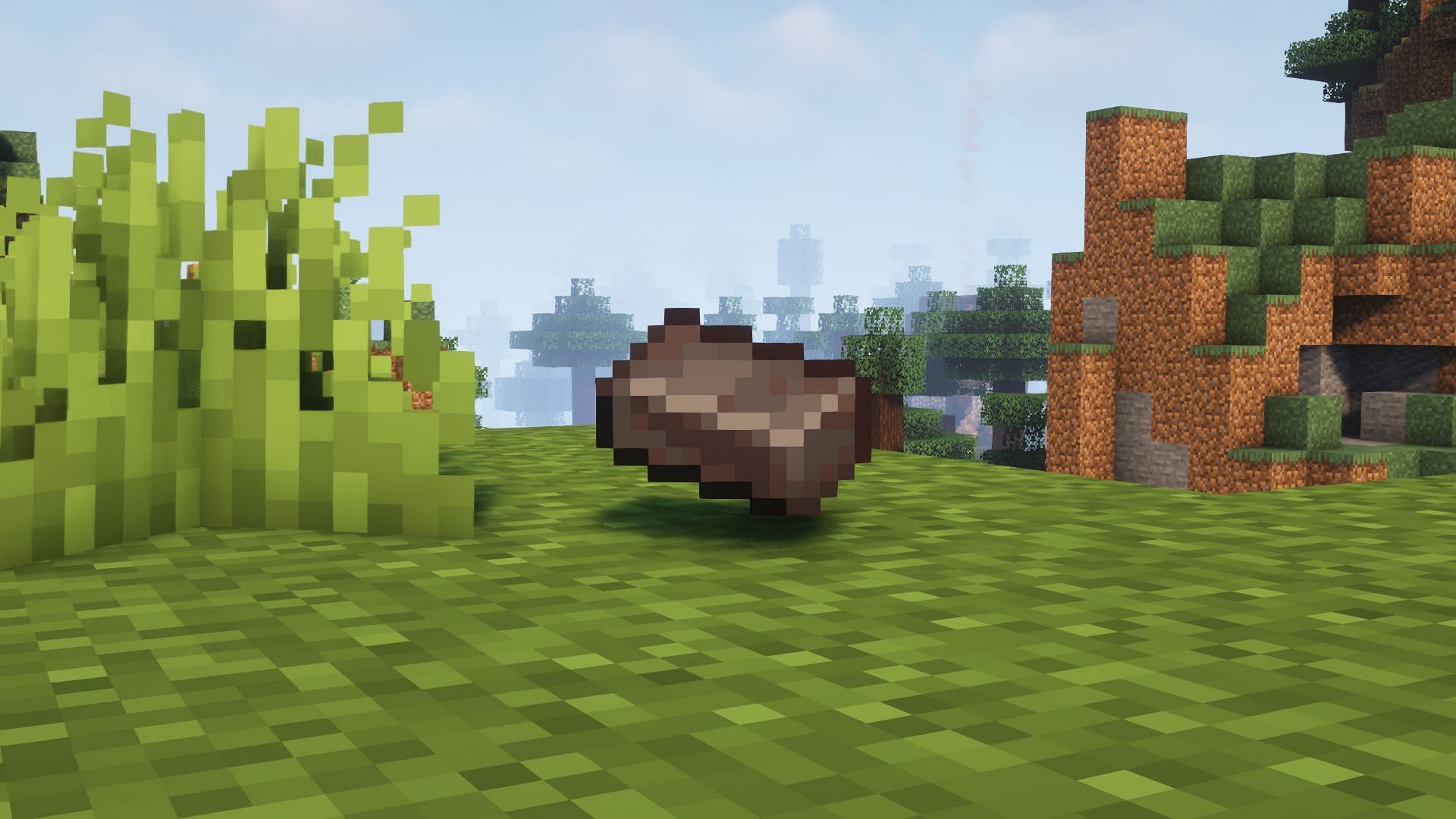 A Netherite ingot in the game (Image via Minecraft)