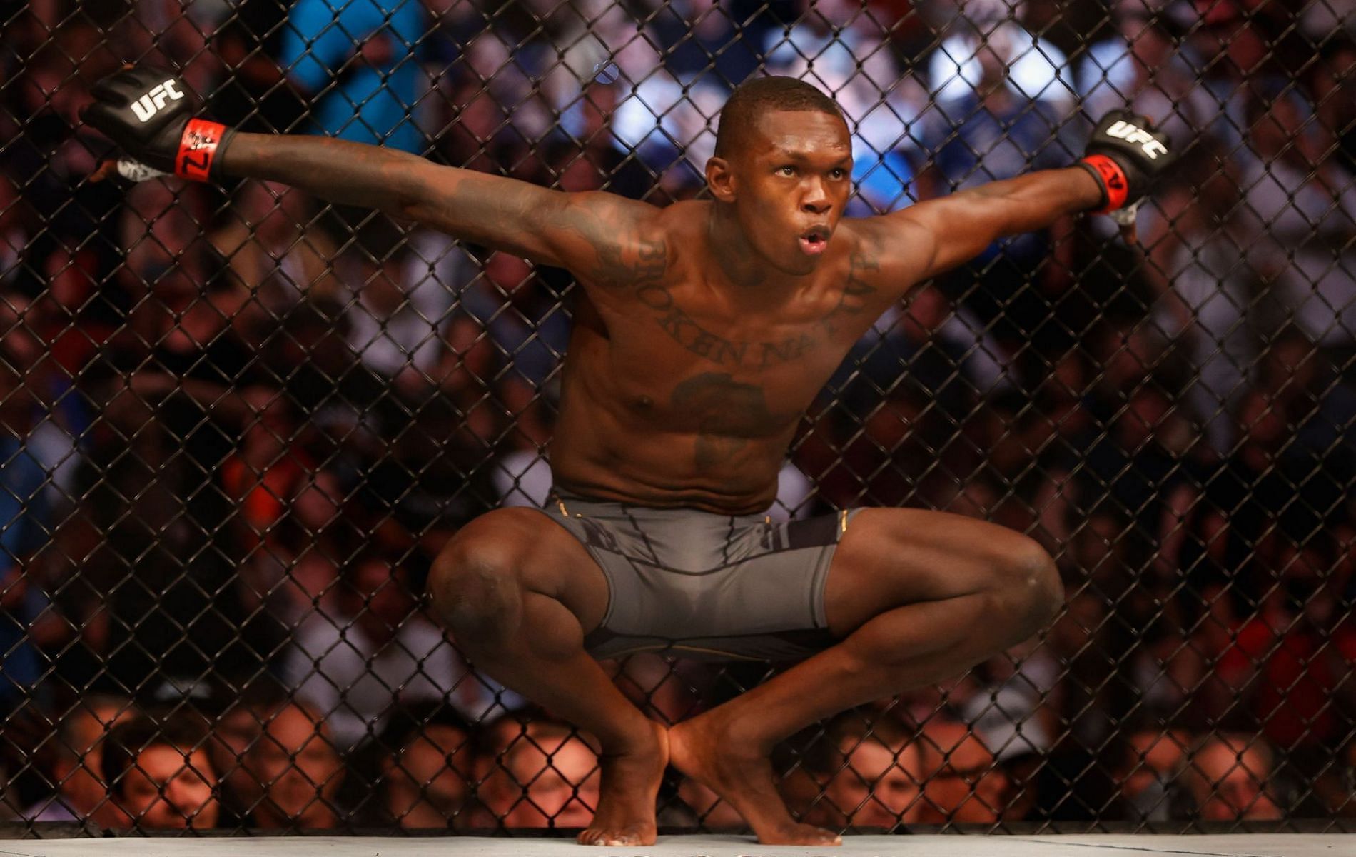Israel Adesanya hit his signature pose at UFC 263.