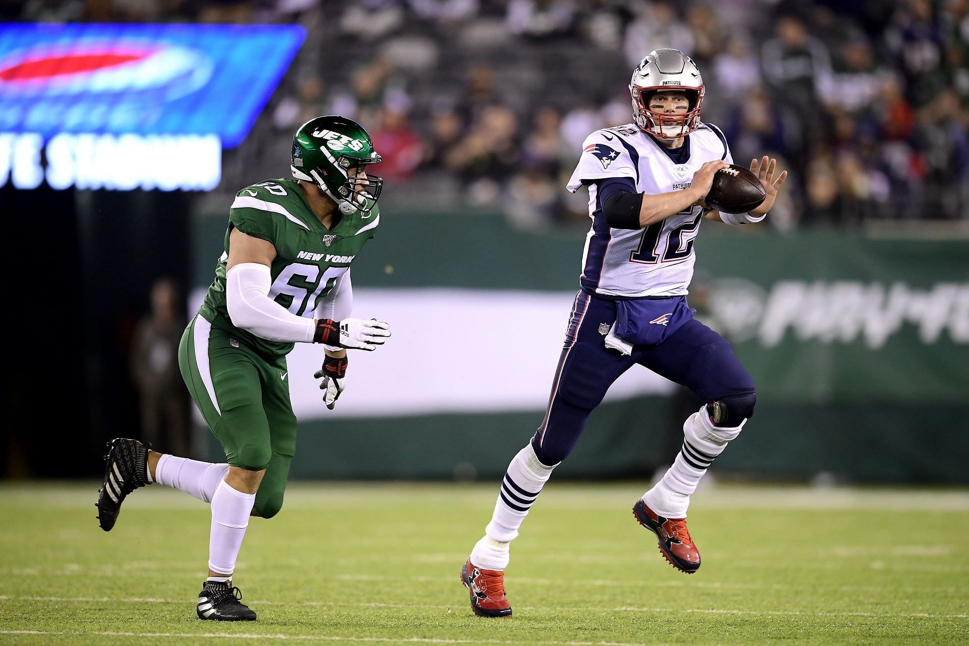 Tom Brady playing for the New England Patriots against the New York Jets