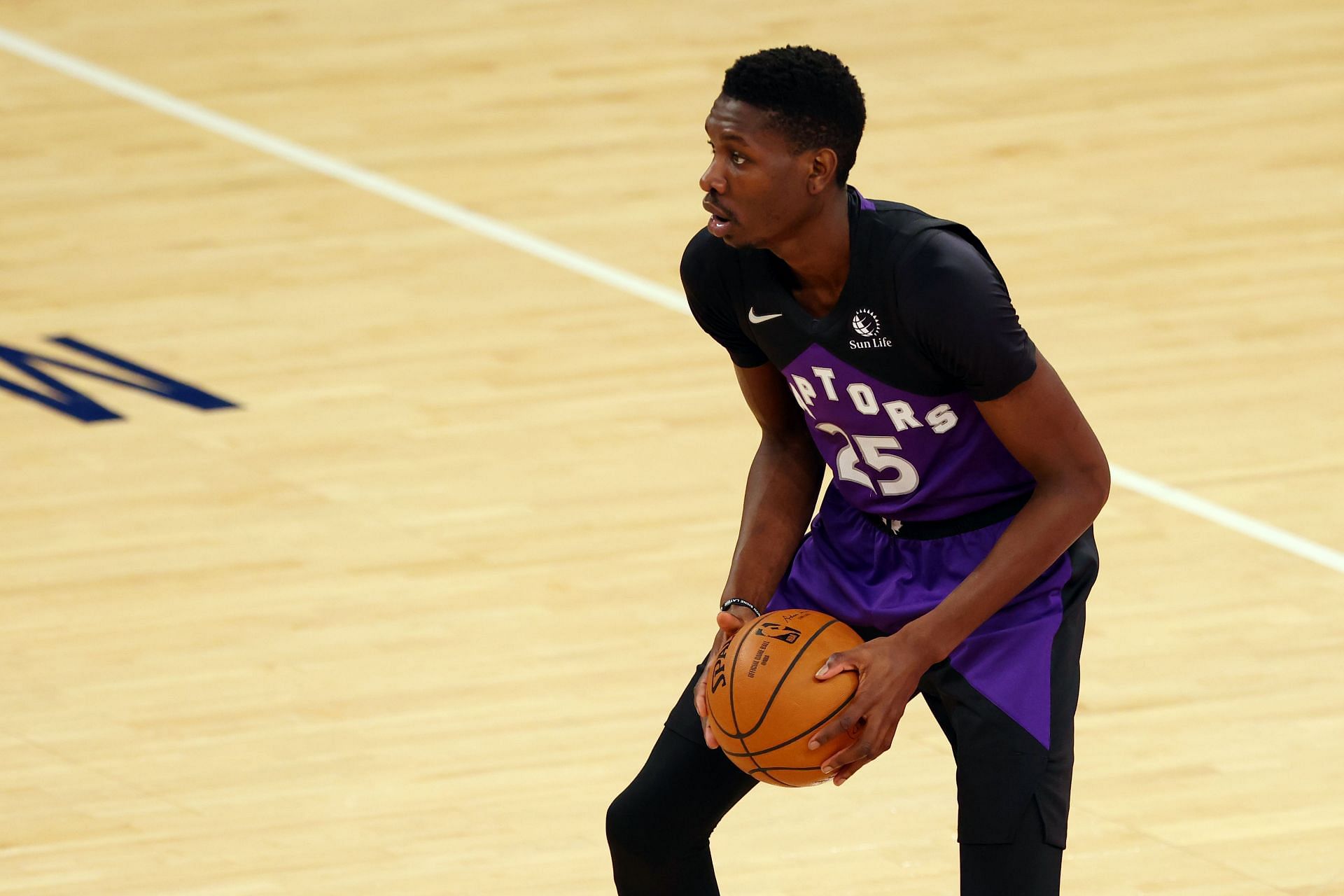 Chris Boucher #25 of the Toronto Raptors in action against the New York Knicks during a game at Madison Square Garden on April 11, 2021 in New York City. The Knicks defeated the Raptors 102-96.