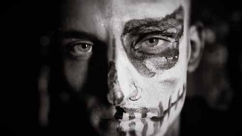 A close up image of AEW star Darby Allin's face paint