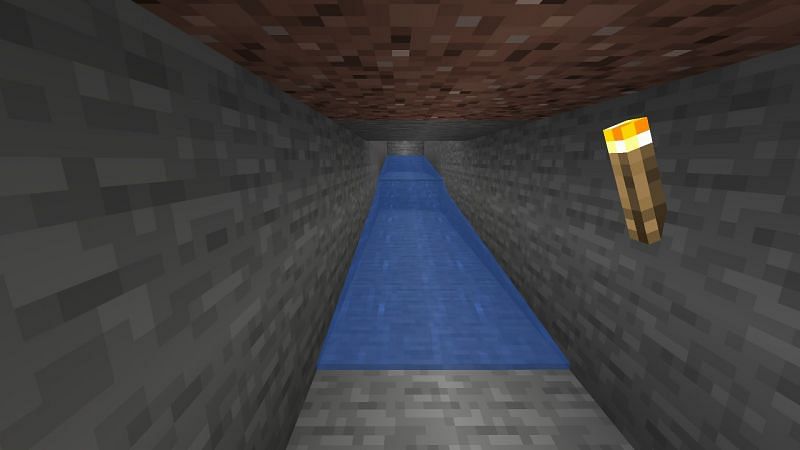 Step 3 entails digging both blocks and stifling water flow (Image via Mojang)