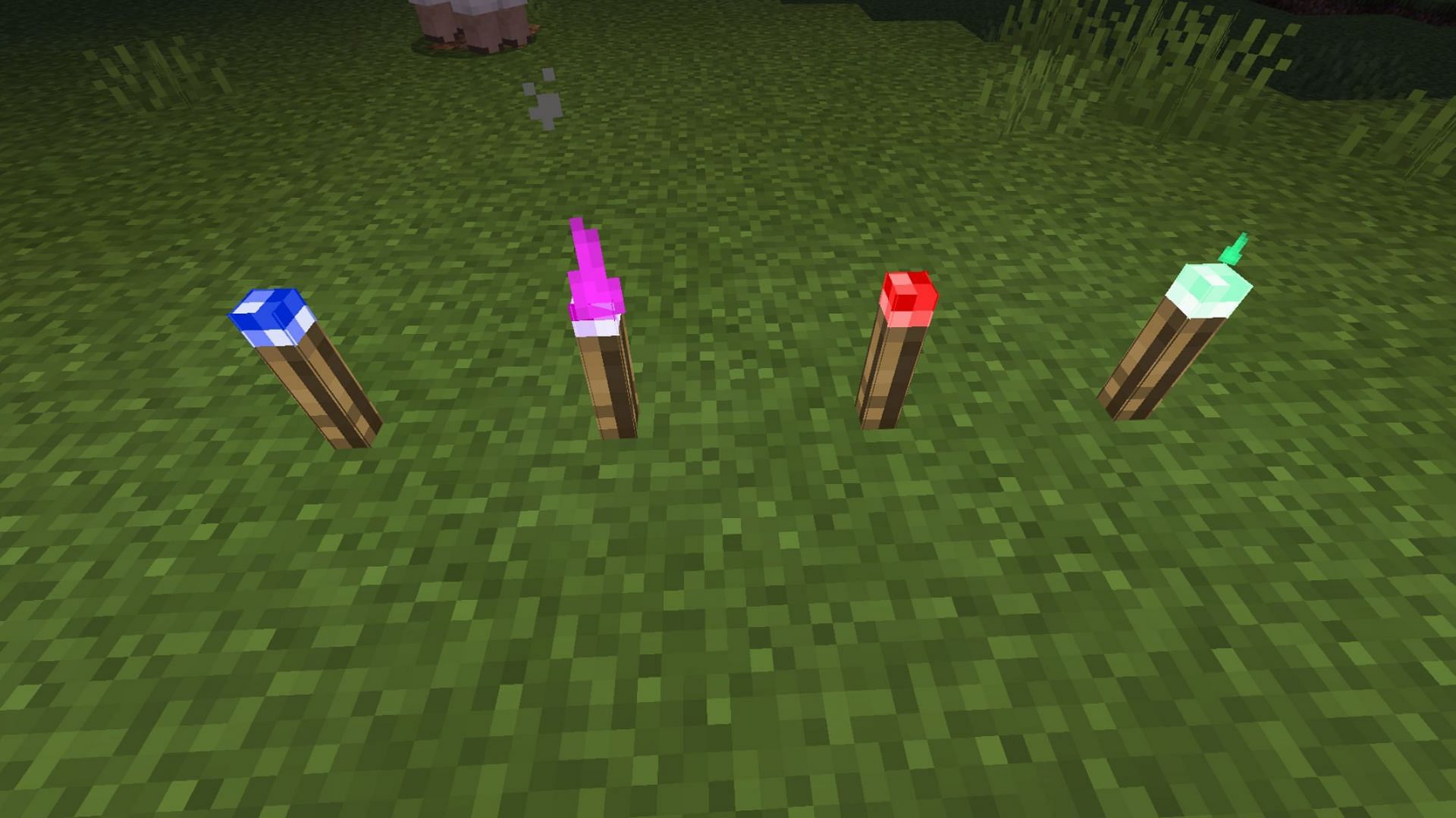 Colored torches add a bit of flair to lighting up areas (Image via Mojang)