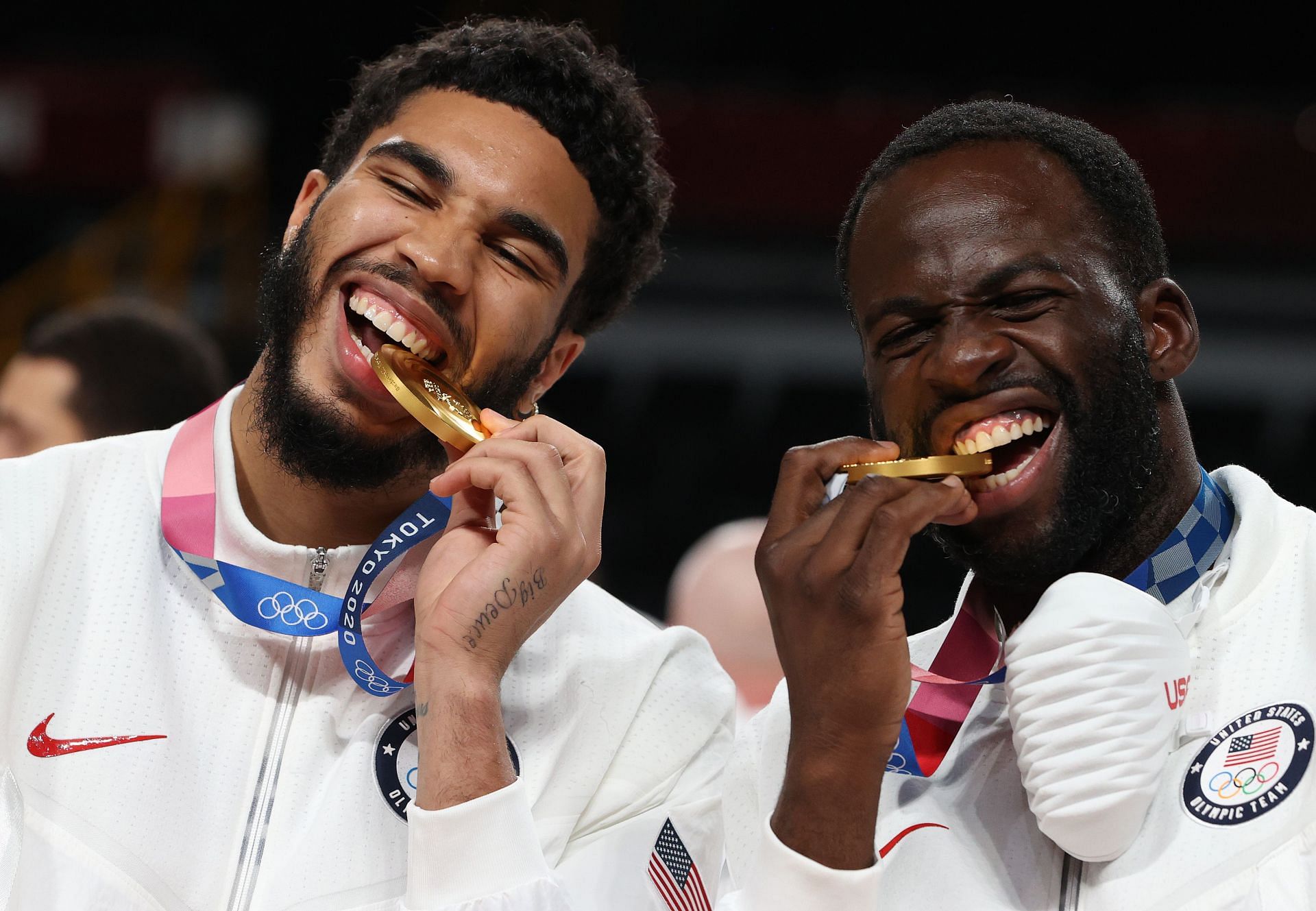 Jayson Tatum and Draymond Green of Team United States pose with their Olympic gold nedals
