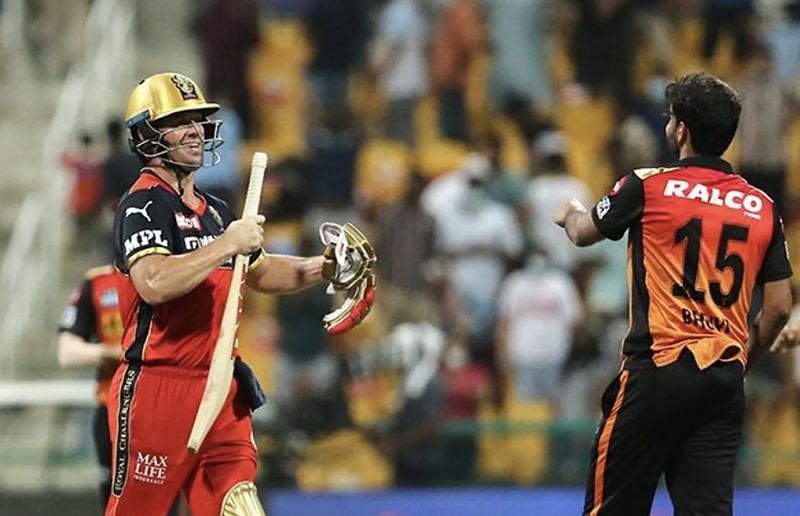AB de Villiers and Bhuvneshwar Kumar share a light moment after the match. (Photo: BCCI)