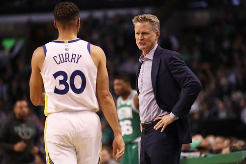 Steph Curry and Steve Kerr during a game