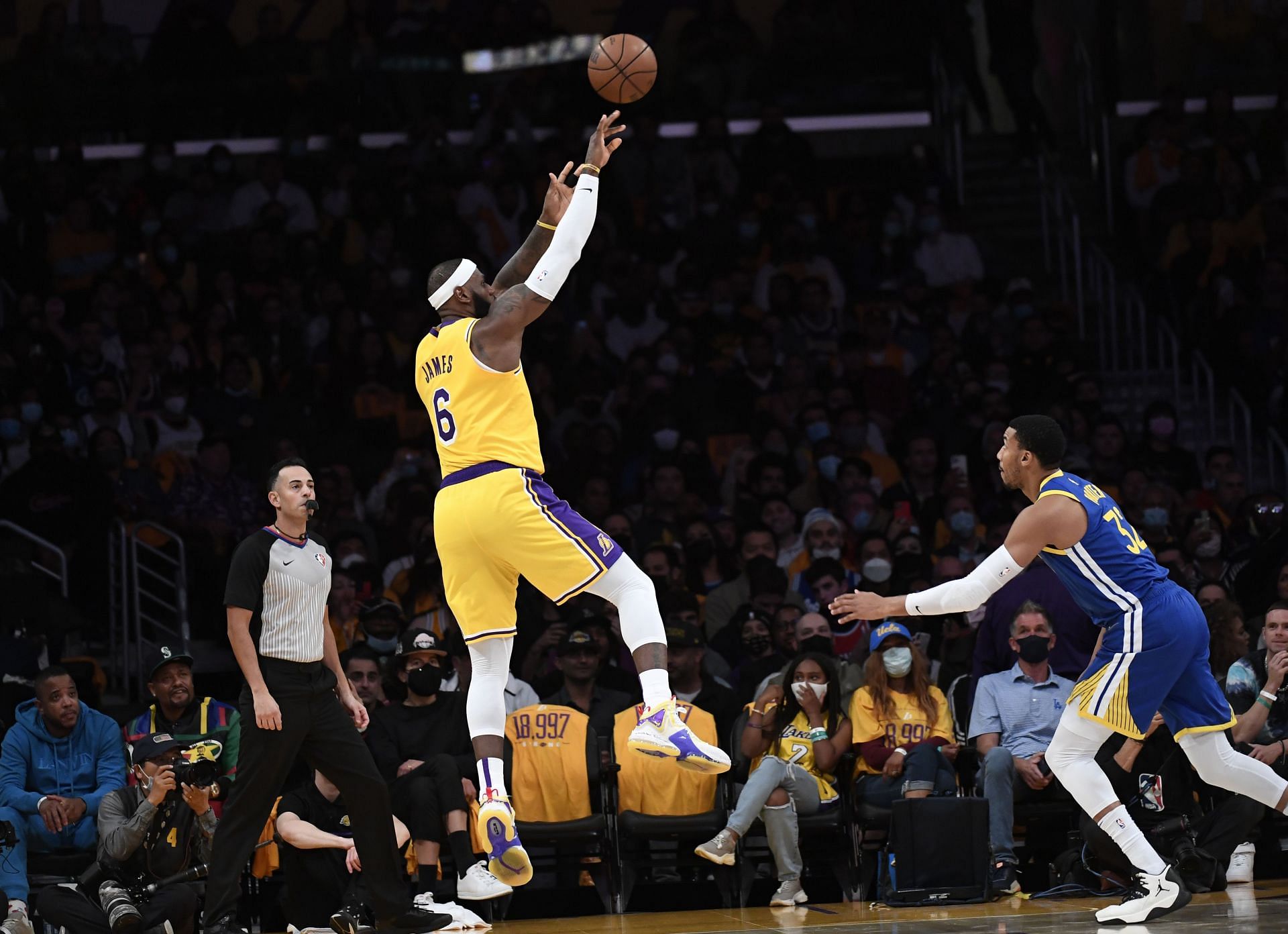 LeBron James #6 of the LA Lakers shoots a three-point basket.