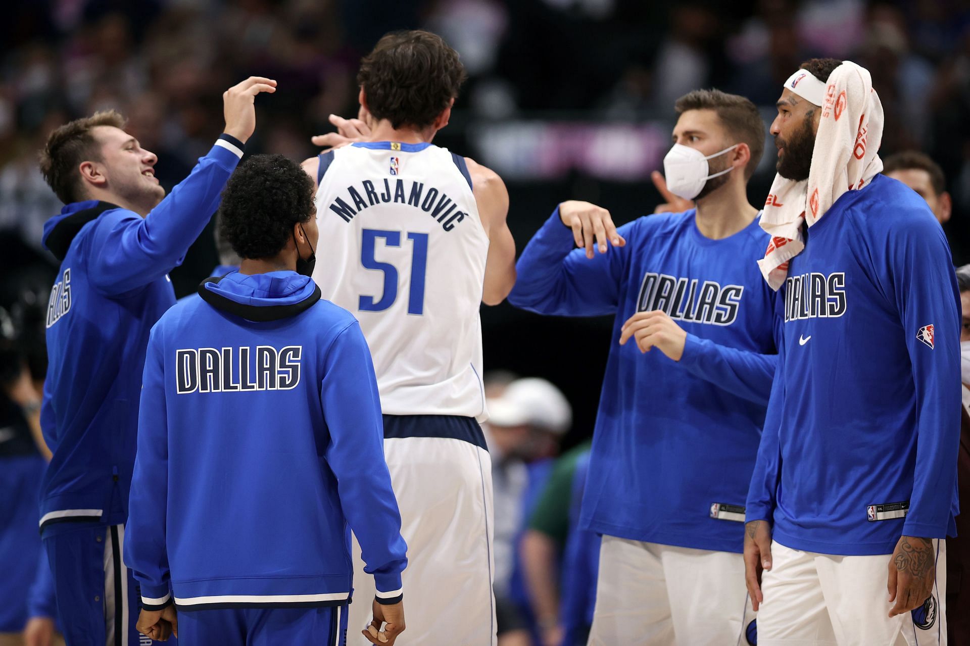 Boban Marjanovic (#51( of the Dallas Mavericks celebrates with Luka Doncic (#77).