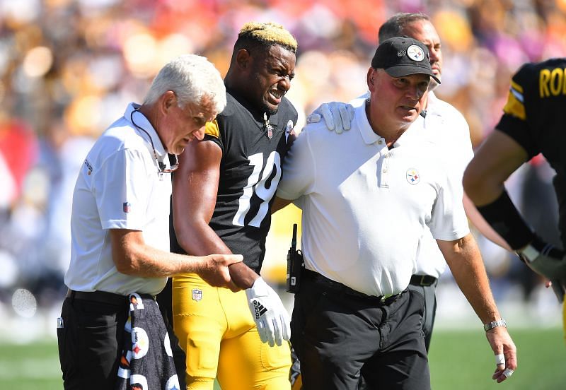 JuJu Smith-Schuster being helped off the field