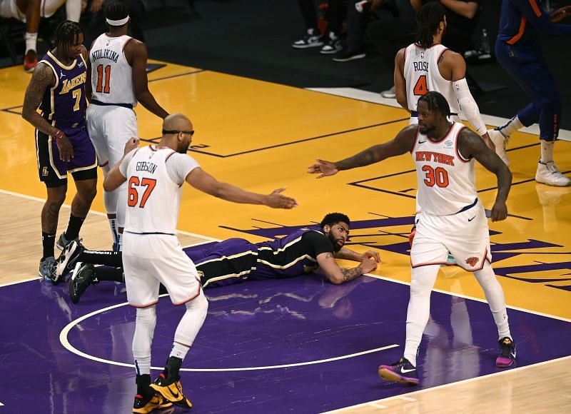 Julius Randle #30 and Taj Gibson #67 of the New York Knicks celebrate a defensive stop