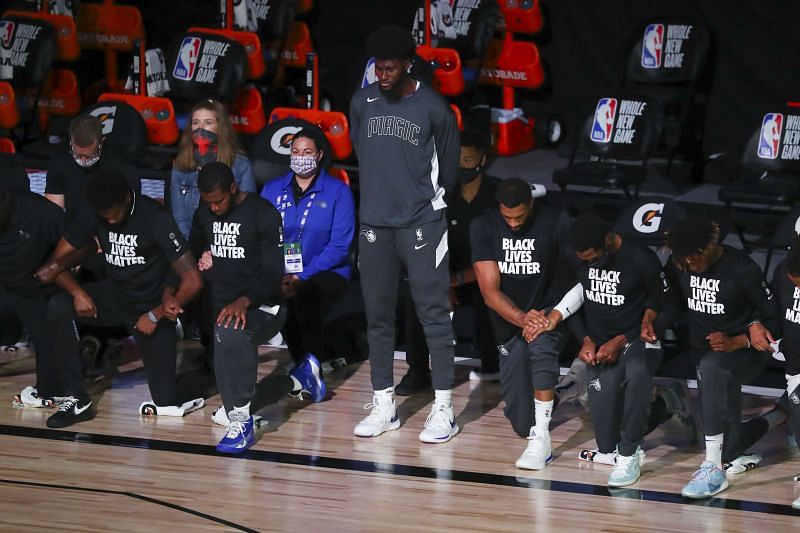 Orlando Magic power forward Jonathan Isaac standing during the national anthem