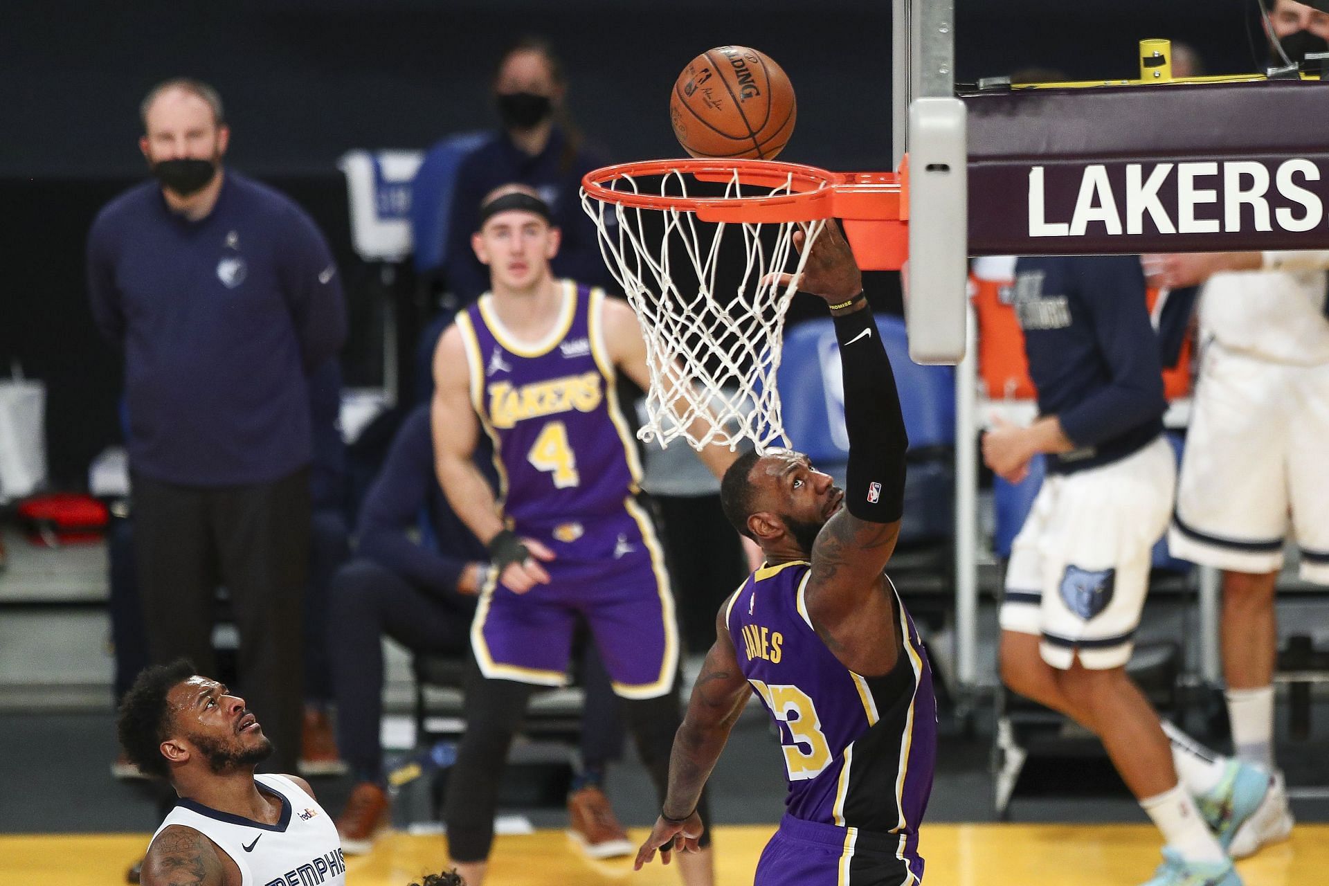 Los Angeles Lakers star LeBron James lays it in against the Memphis Grizzlies in the 2020-21 NBA season