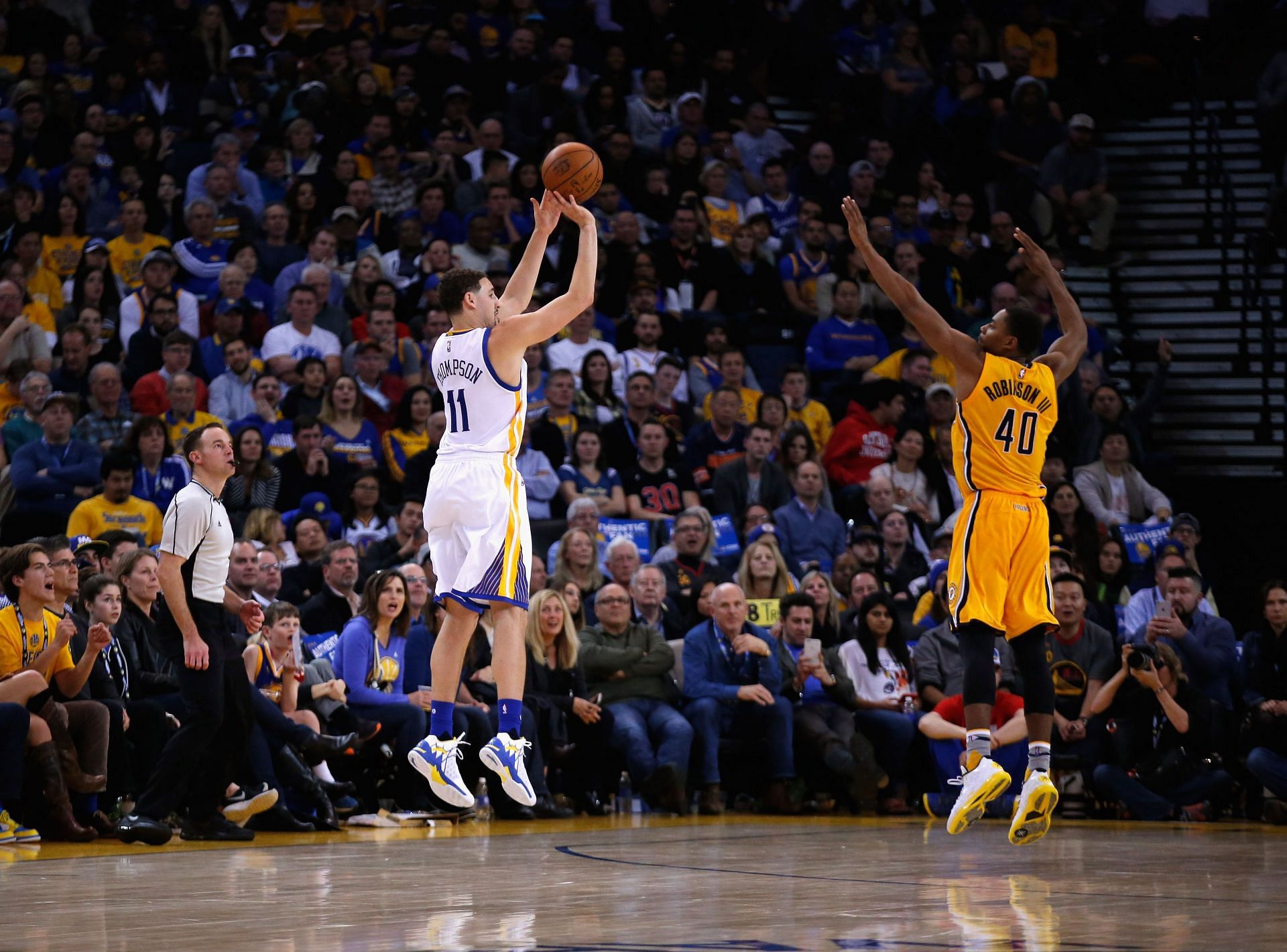 Klay Thompson #11 of the Golden State Warriors shoots.