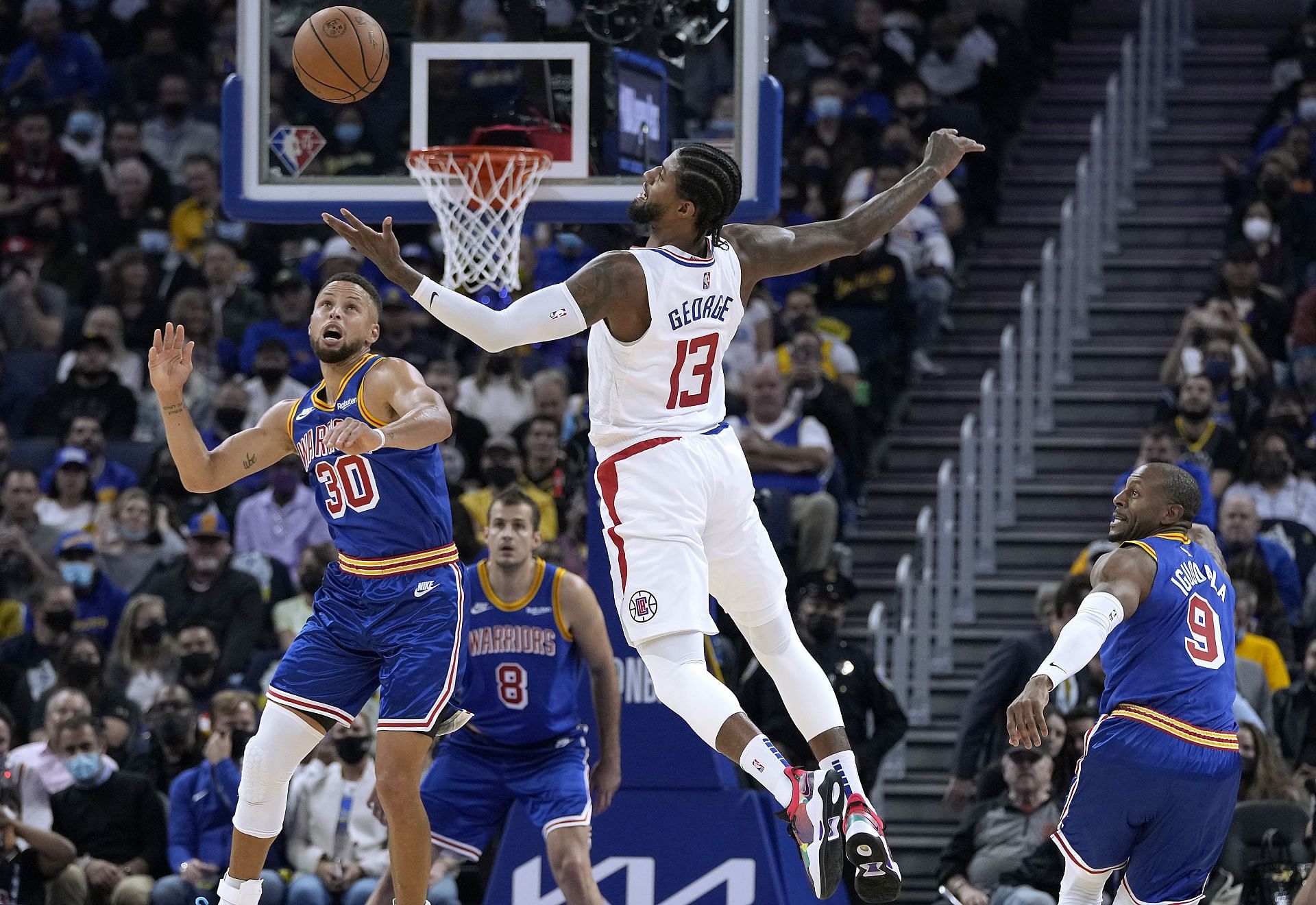 Stephen Curry steals the ball from Paul George to start the Golden State Warriors' fastbreak