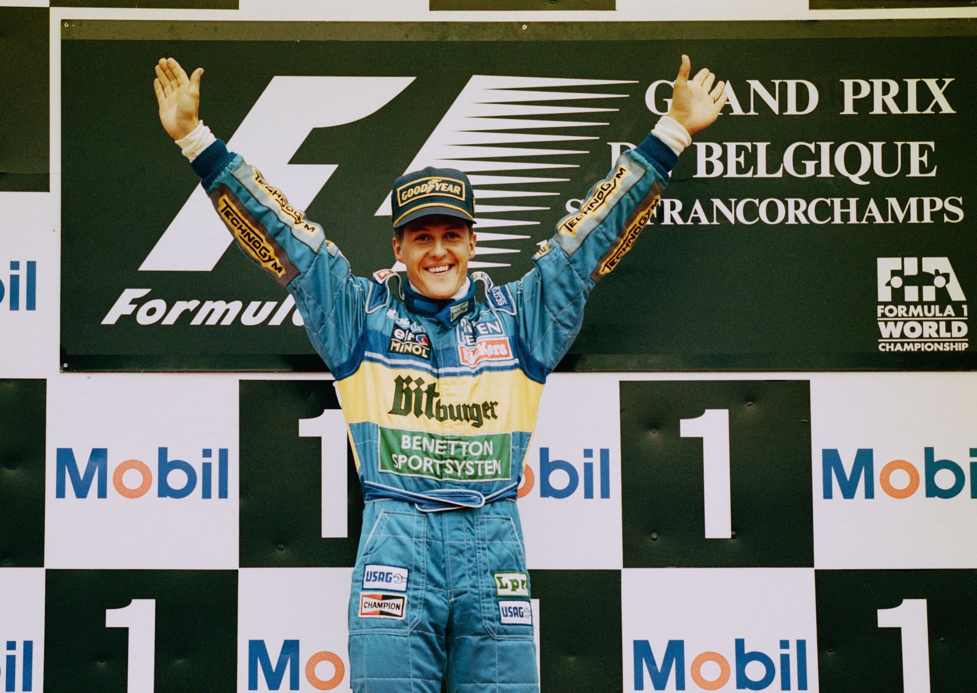 World Champion Michael Schumacher celebrates winning the 1995 Belgian Grand Prix at the Circuit de Spa-Francorchamps in Spa Francorchamps, Belgium. (Photo by Ben Radford/Getty Images)