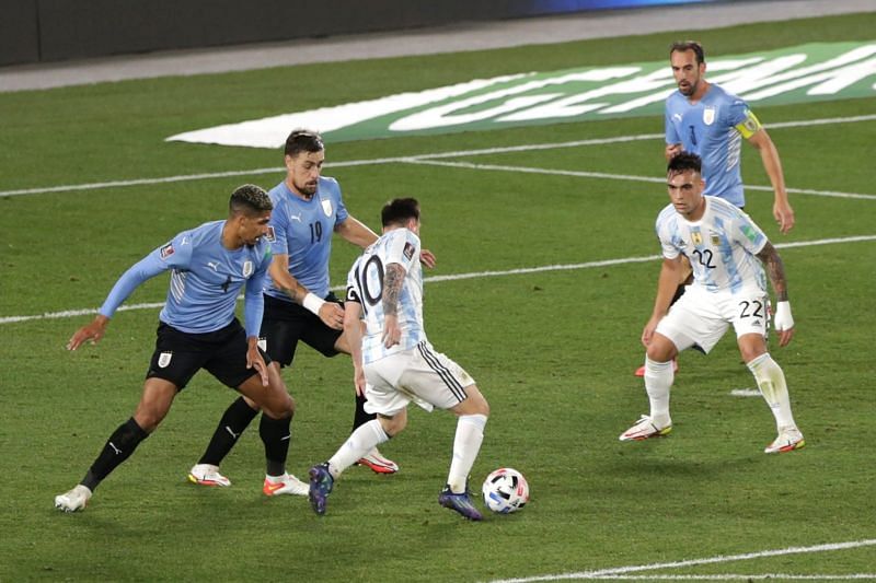Uruguay were shambolic defensively against Argentina. Lionel Messi celebrates scoring Argentina&#039;s opener.