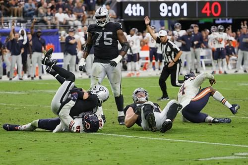 Chicago Bears linebacker Khalil Mack sacks Las Vegas Raiders quarterback Derek Carr