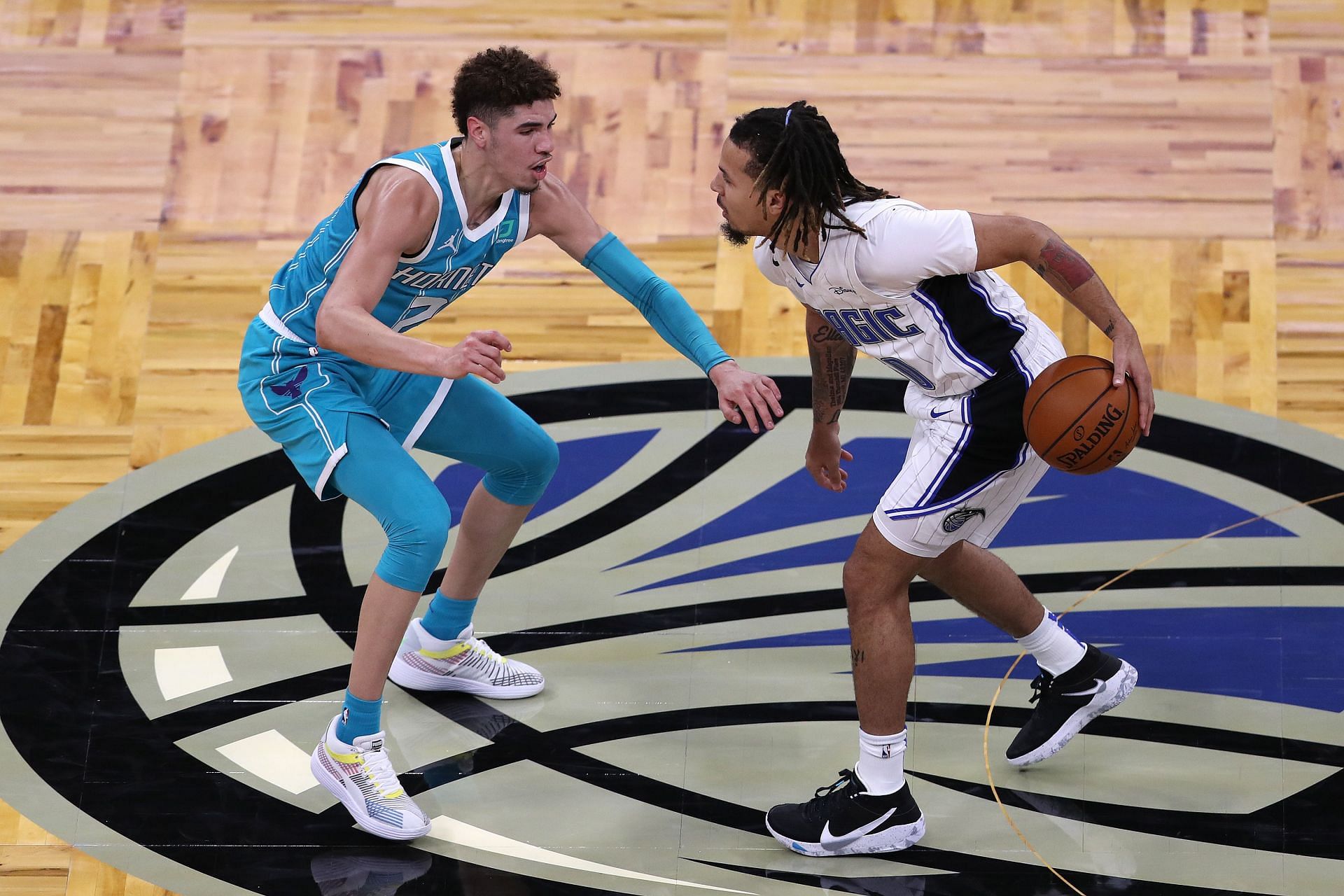 LaMelo Ball (left) defends Cole Anthony (right)