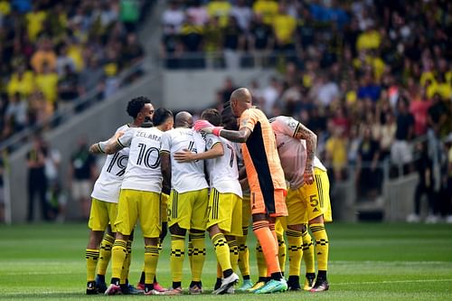 The Columbus Crew huddles before a game 