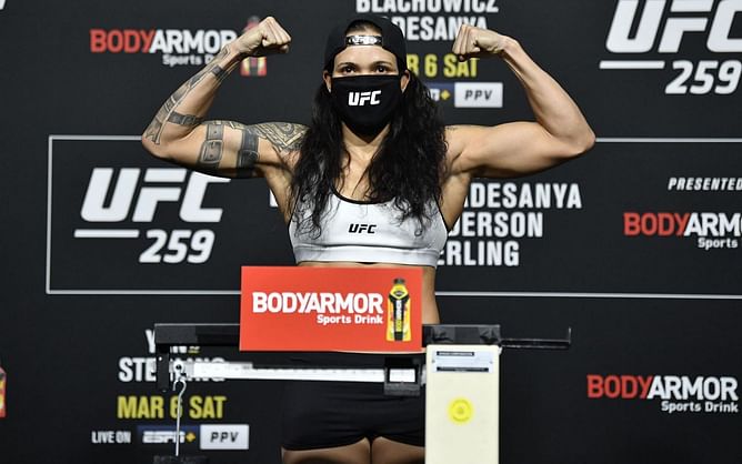 What is Amanda Nunes' pre-fight walk round weight?