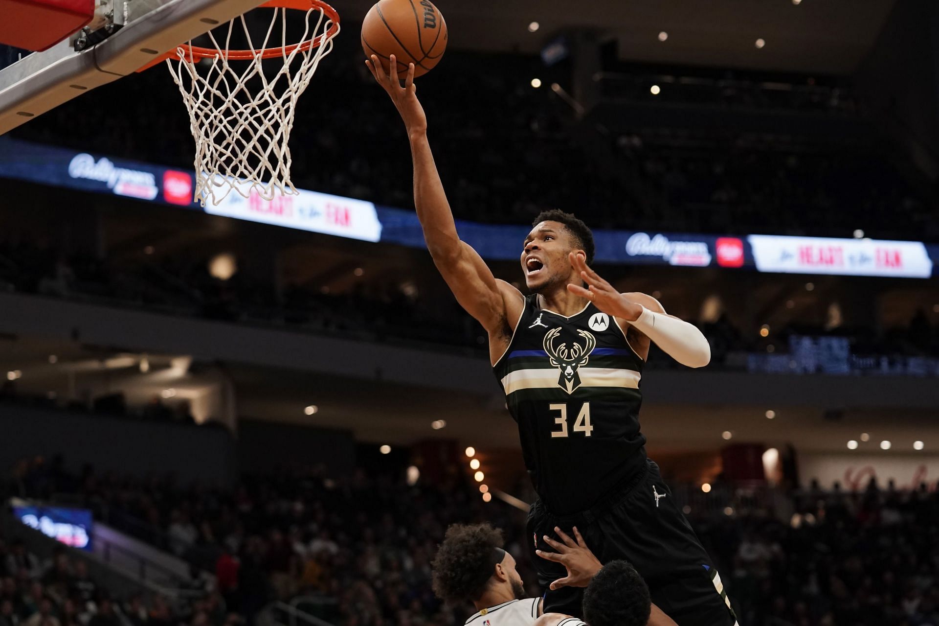 Giannis Antetokounmpo attempts to score a layup.