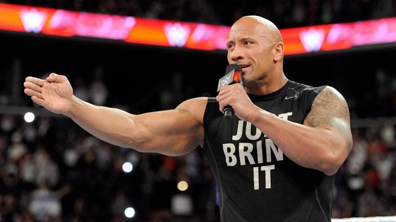 The Rock, cutting a promo, during his time with WWE