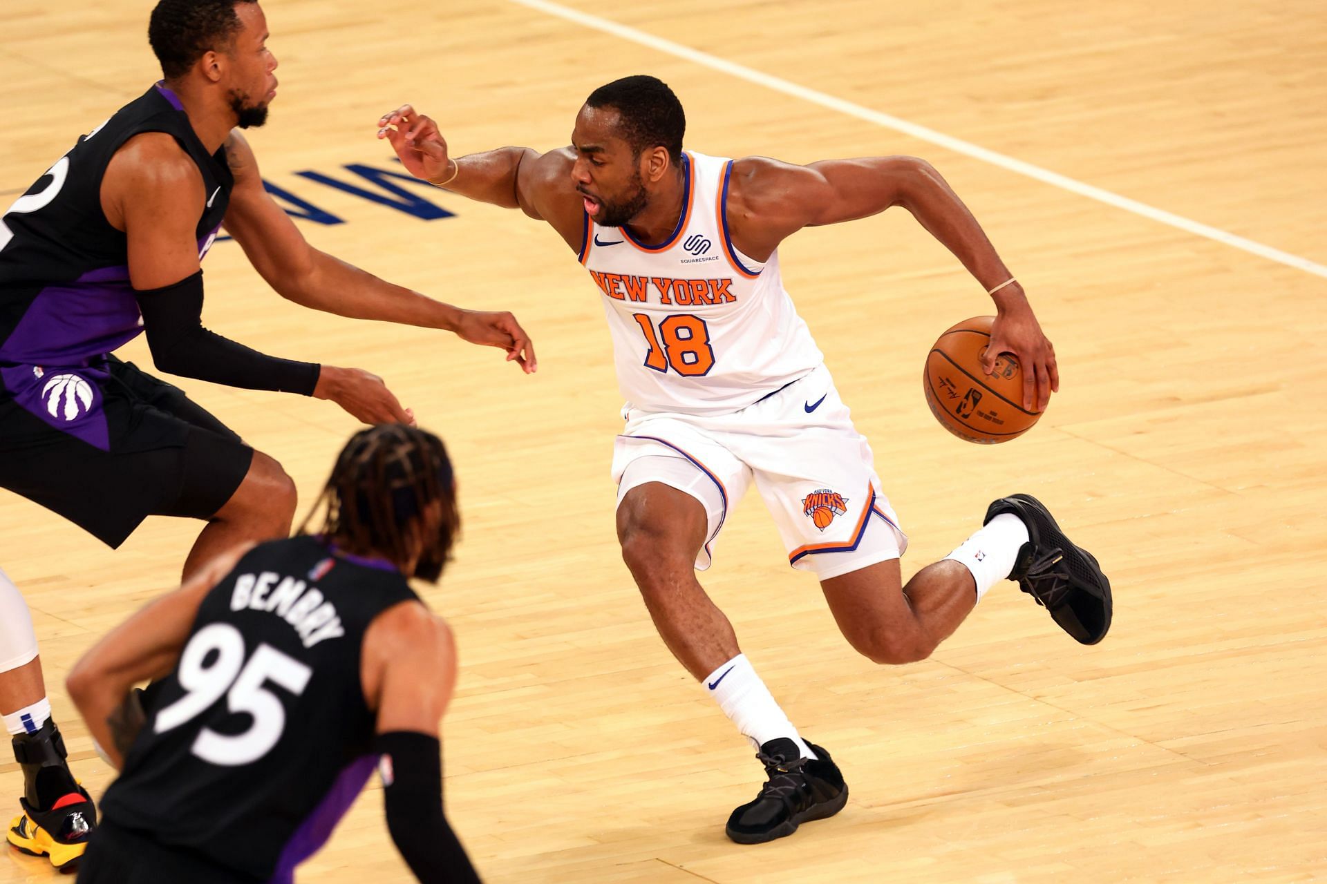 Alec Burks #18 of the New York Knicks in action against the Toronto Raptors