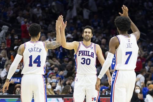 Danny Green #14, Furkan Korkmaz #30, and Isaiah Joe #7 of the Philadelphia 76ers