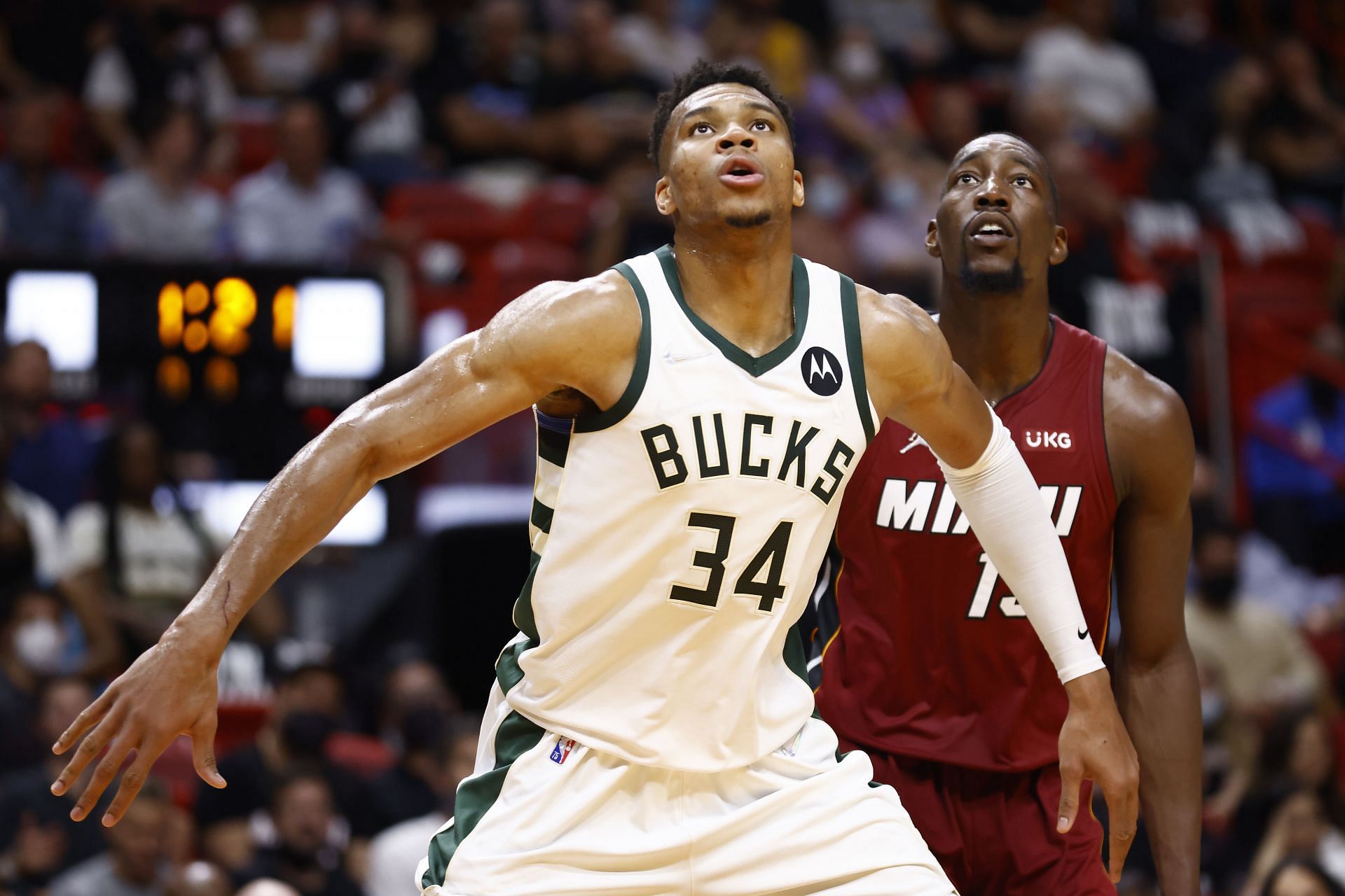 Giannis Antetokounmpo (#34) of the Milwaukee Bucks and Bam Adebayo (#13) of the Miami Heat