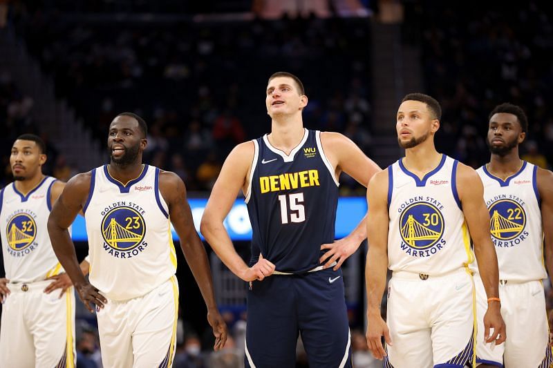 The reigning MVP, Nikola Jokic of the Denver Nuggets with Stephen Curry and the Golden State Warriors