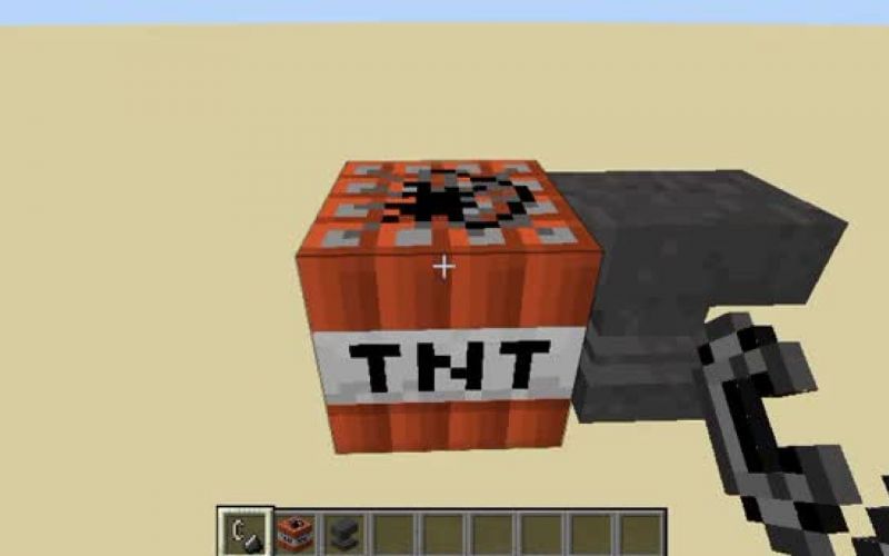 An image of an anvil next to a TNT block in Minecraft. (Image via Mojang).