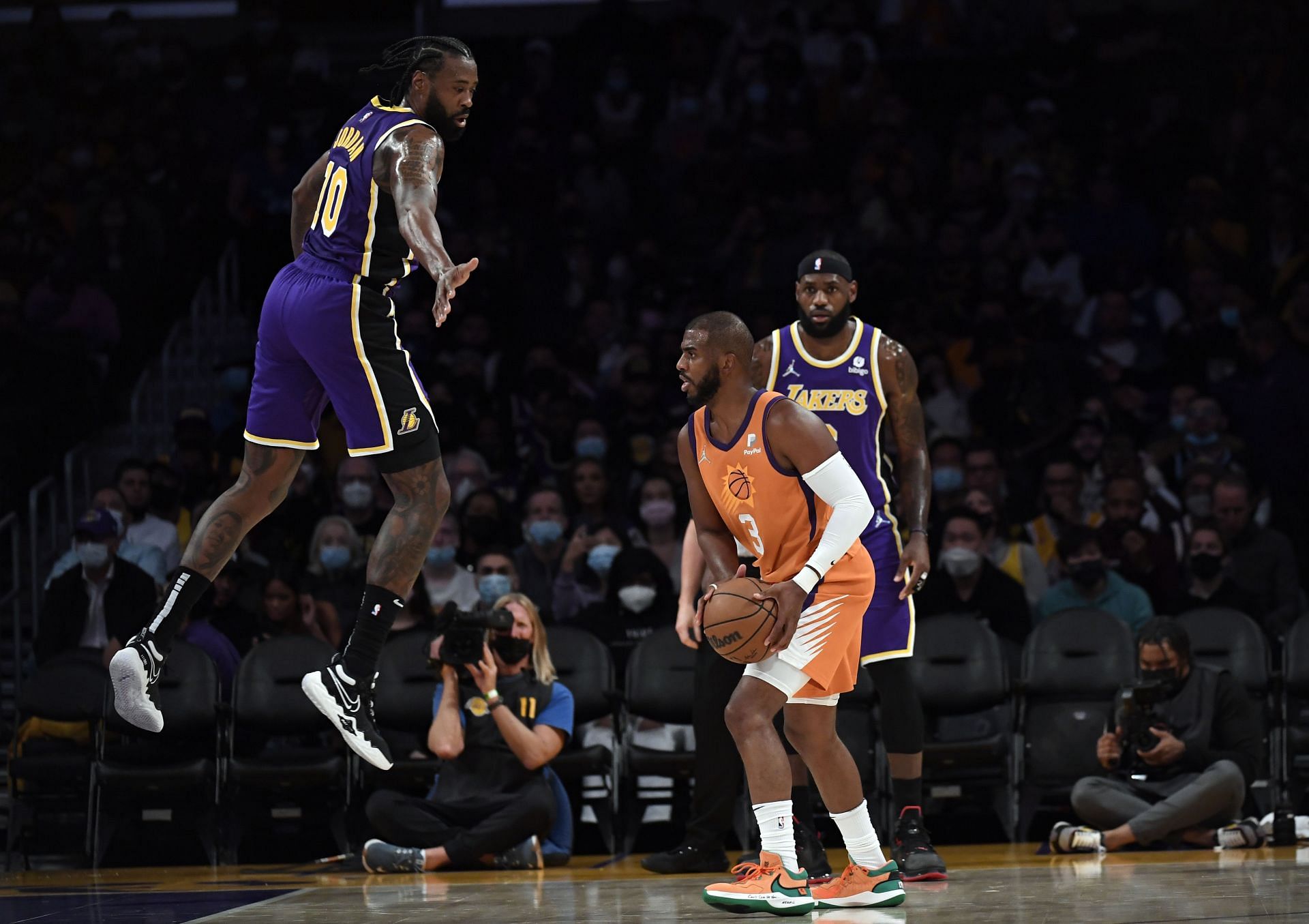 Phoenix Suns superstar Chris Paul attempting a three-pointer against the LA Lakers