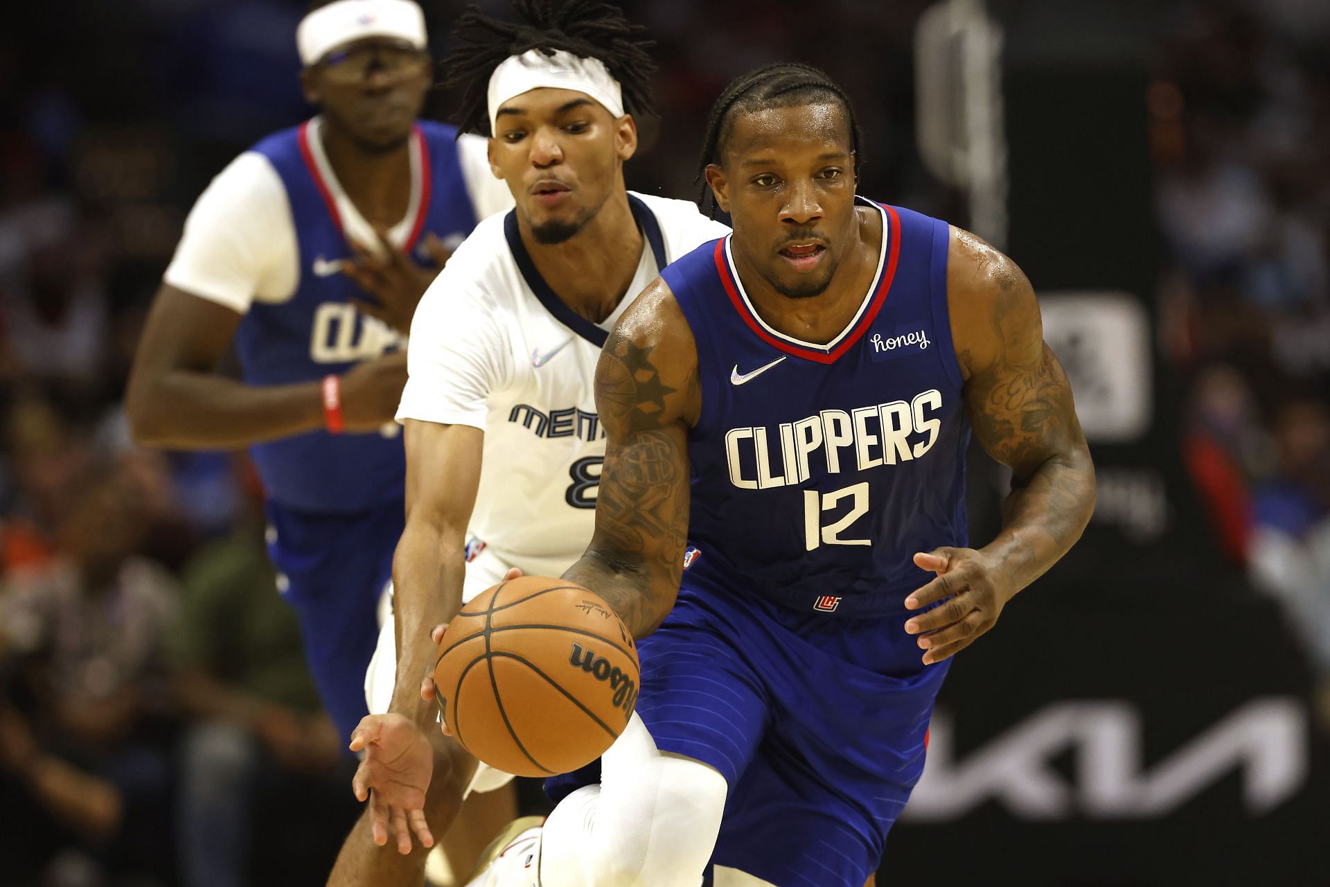 Eric Bledsoe #12 of the LA Clippers dribbles up court during the first half of a game against the Memphis Grizzlies at Staples Center on October 23, 2021 in Los Angeles, California.