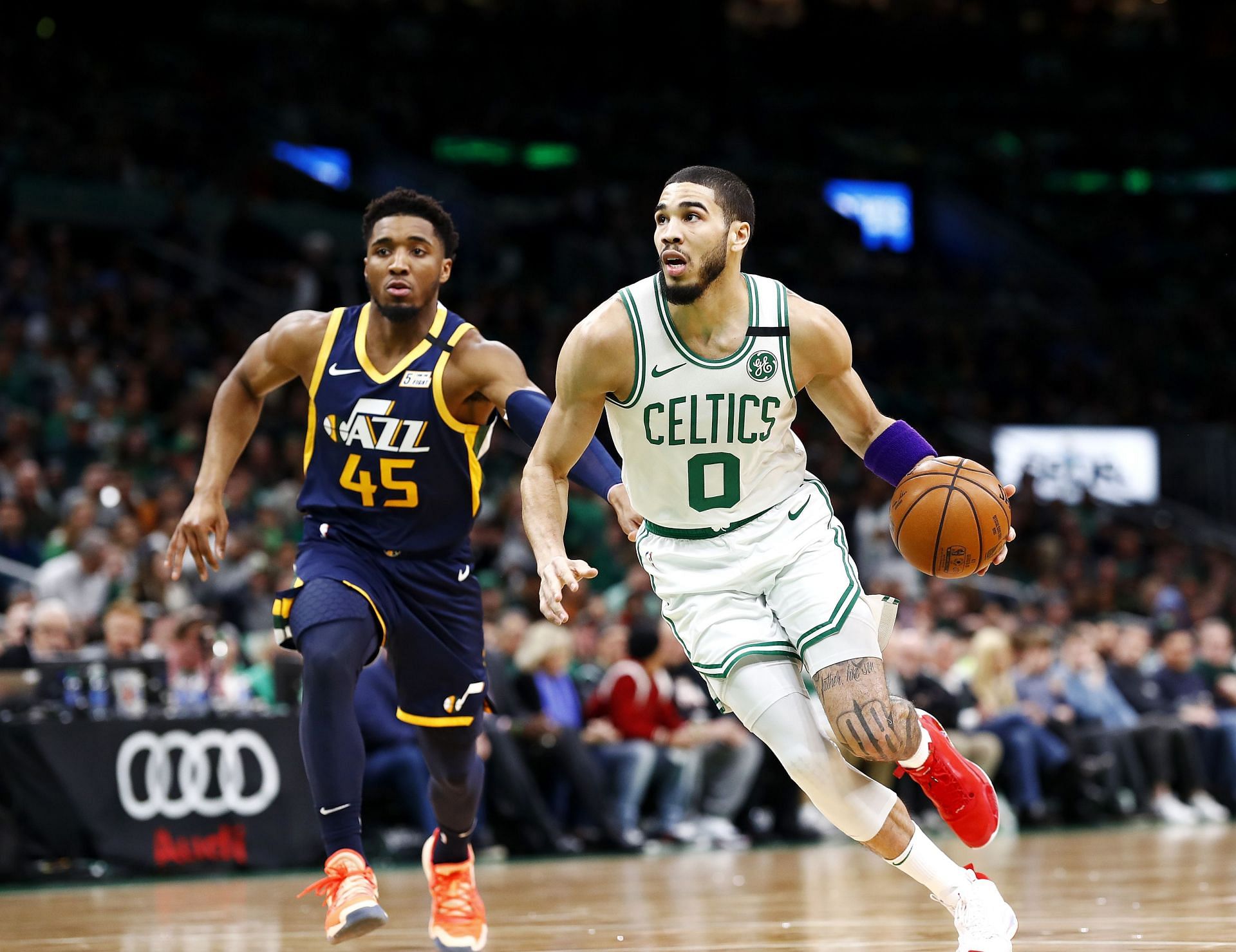 Jayson Tatum driving past Donovan Mitchell in this bit of NBA action [Photo: FanSided]