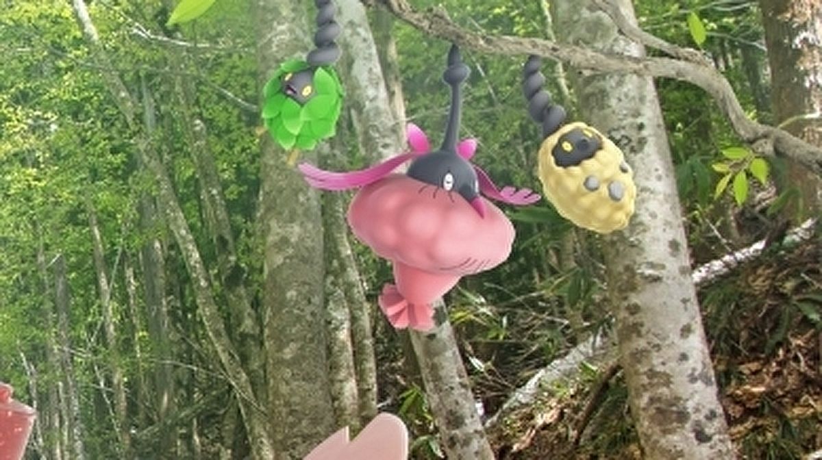 The Burmy forms in a Pokemon GO promotional image (Image via Niantic)
