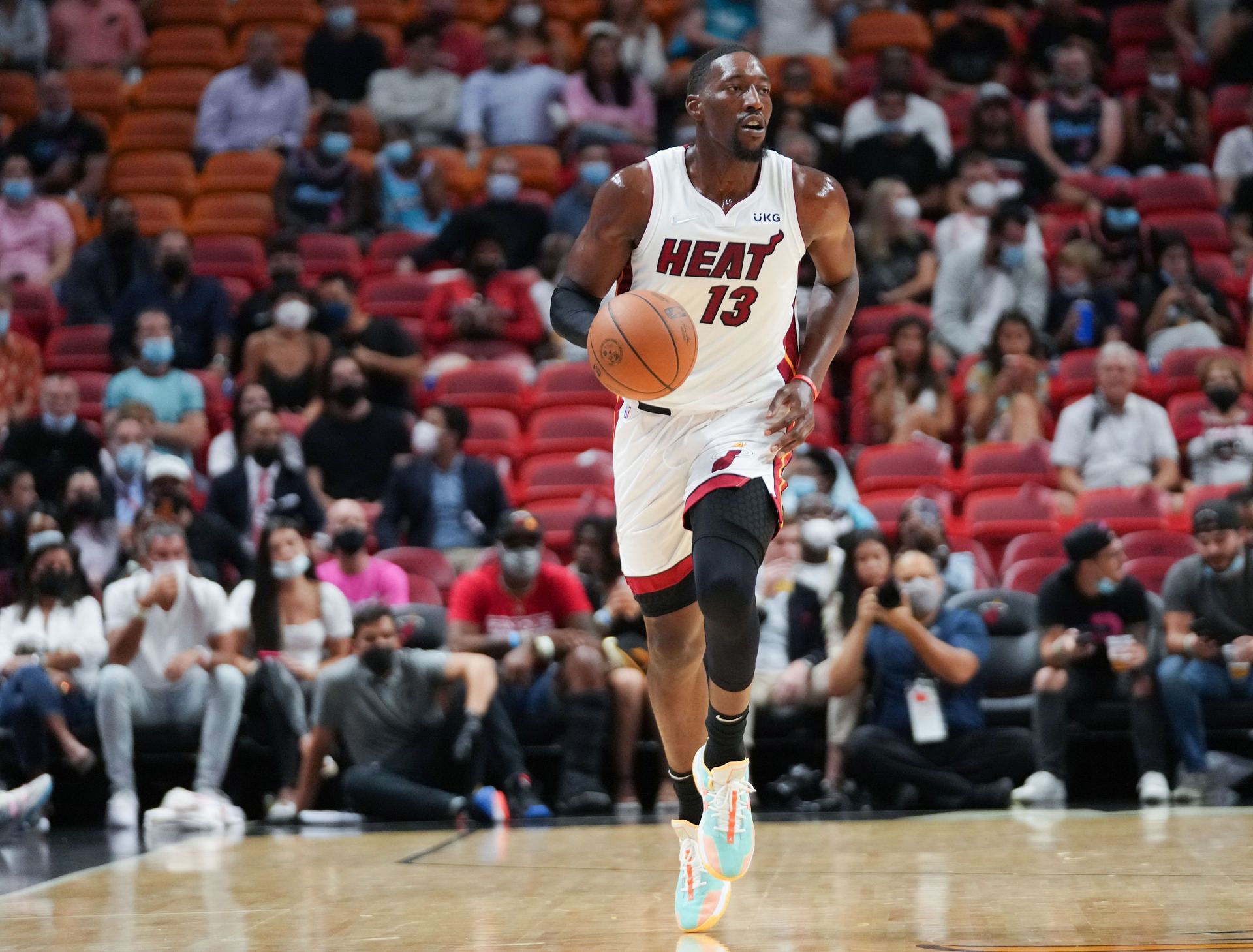 Miami Heat star Bam Adebayo surveying the court in a game